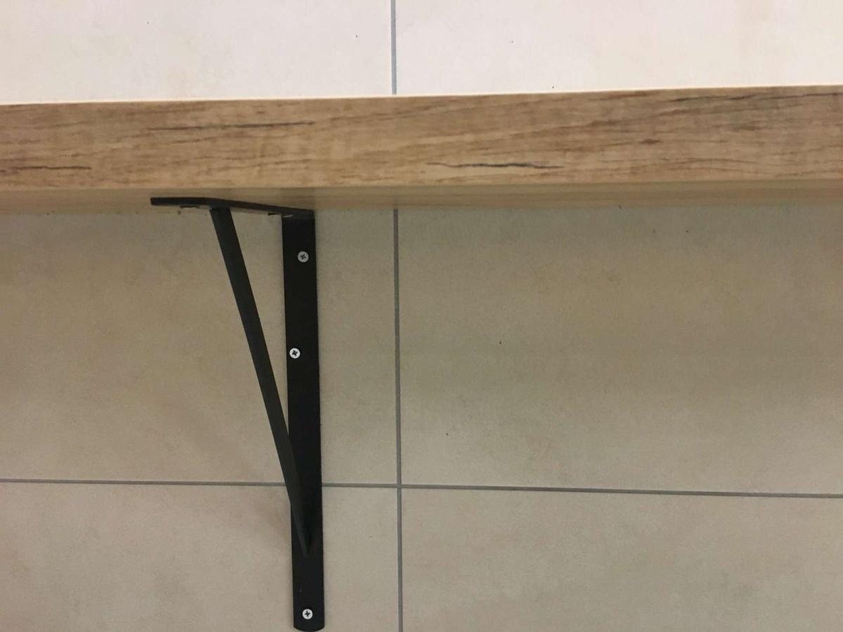 Konzolos elpakoló asztal – termékfotó felülnézet